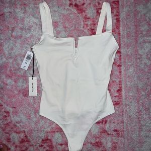 White Aritzia Babaton bodysuit. Brand new with tags!
